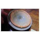 UND Pottery Cookie Jar (asis) Lid has a Crack and base has a hairline in it. UND Pottery Cookie Jar (asis) Lid has a Crack and base has a hairline in it.