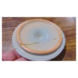 UND Pottery Cookie Jar (asis) Lid has a Crack and base has a hairline in it. UND Pottery Cookie Jar (asis) Lid has a Crack and base has a hairline in it.