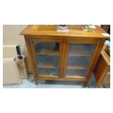 Newer Wood 2 Door Bookcase/ Curio (40.5" x 39.5" x 16") Newer Wood 2 Door Bookcase/ Curio (40.5" x 39.5" x 16")