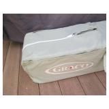 Graco pack-and-play in travel carri...