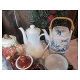 Collectable tea pots in varying sha...