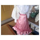 Vintage porcelain doll with stand...