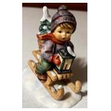 Vintage Hummels including "Ride into Christmas", "Peaceful Offering", "Skier", "Merry Wanderer" and "Lost Sheep"