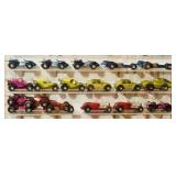 Collection of over 50  Vintage Die-Cast Toy Cars and Trucks in Display Case