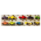 Collection of over 50  Vintage Die-Cast Toy Cars and Trucks in Display Case