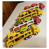 Collection of Vintage Tonka Toy Car Haulers with Die-Cast Cars