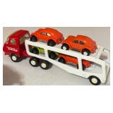 Collection of Vintage Tonka Toy Car Haulers with Die-Cast Cars
