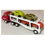 Collection of Vintage Tonka Toy Car Haulers with Die-Cast Cars