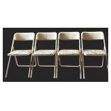 Four Costco Folding Chairs with Fabric Seats