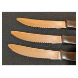 Three Cutco Serrated Steak Knives