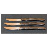Three Cutco Serrated Steak Knives