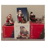 Four Clothique Santa Figurines