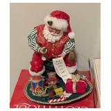 Four Clothique Santa Figurines