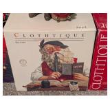 Four Clothique Santa Figurines
