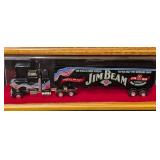 Four Beverage Diecast Semi Trucks and Cases