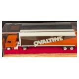 Four Beverage Diecast Semi Trucks and Cases