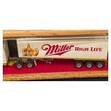 Four Beverage Diecast Semi Trucks and Cases