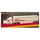 Six Diecast Semi Trucks and Cases