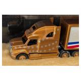 Six Diecast Semi Trucks and Cases