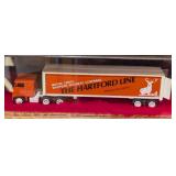 Six Diecast Semi Trucks and Cases