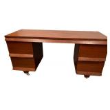 Vintage Wooden Desk with Six Drawers and Casters Vintage Wooden Desk with Six Drawers and Casters