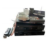 Electronics Lot: RCA and Samsung Players, Radios, Remote Controls, SOLIDEX Model Car Electronics Lot: RCA and Samsung Players, Radios, Remote Controls, SOLIDEX Model Car
