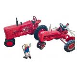 Set of 2 Farmall Die-Cast Tractor Models with Farmer Figures Set of 2 Farmall Die-Cast Tractor Models with Farmer Figures