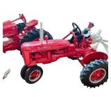 Set of 2 Farmall Die-Cast Tractor Models with Farmer Figures Set of 2 Farmall Die-Cast Tractor Models with Farmer Figures