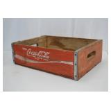 Vintage Wooden Coca-Cola Crate with Red Paint and Metal Reinforcement Vintage Wooden Coca-Cola Crate with Red Paint and Metal Reinforcement