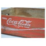 Vintage Wooden Coca-Cola Crate with Red Paint and Metal Reinforcement Vintage Wooden Coca-Cola Crate with Red Paint and Metal Reinforcement