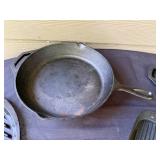 Set of Assorted Cast Iron Skillets and Grill Pans