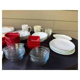 Assorted Dinnerware Collection with Plates, Bowls, Mugs, and Ramekins