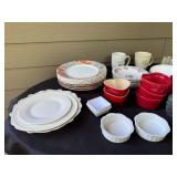 Assorted Dinnerware Collection with Plates, Bowls, Mugs, and Ramekins