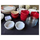 Assorted Dinnerware Collection with Plates, Bowls, Mugs, and Ramekins