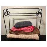 Metal Blanket Rack with Assorted Blankets