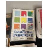 Assorted Office Supplies with Paper, Folders, and Calendars