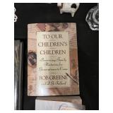 Mixed Lot of Family-Themed Books, Decorative Glassware, and Wall Clock