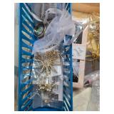 Assorted Craft Supplies and Gift Items including Ribbons, Jewelry Gift Boxes, Notepad, and Book