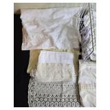 Collection of Vintage Linens and Lace Table Decor with Wire Basket