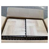 Box of Interlocking Wood-Look Floor Tiles by Greatmats