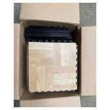 Box of Interlocking Wood-Look Floor Tiles by Greatmats