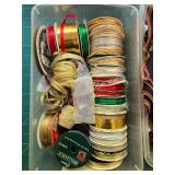 Craft Supplies Collection with Assorted Ribbons, Fabric Pieces, and Yarn