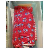 Craft Supplies Collection with Assorted Ribbons, Fabric Pieces, and Yarn