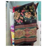 Craft Supplies Collection with Assorted Ribbons, Fabric Pieces, and Yarn