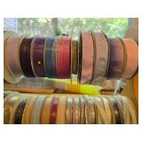 Collection of Assorted Decorative Ribbon Spools with Wooden Rack