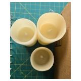 Collection of Red and Ivory Candles in Glass and Pillar Styles