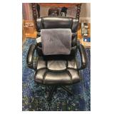 Black Leather Office Chair with Padded Armrests and Lumbar Cushion