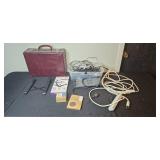 Collection of Laptop Accessories, Surge Protectors, Wires, and Vintage Briefcase