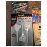 Assorted Office and School Supplies Collection with Scissors, Pens, Laminating Sheets, and Awards