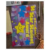 Assorted Office and School Supplies Collection with Scissors, Pens, Laminating Sheets, and Awards